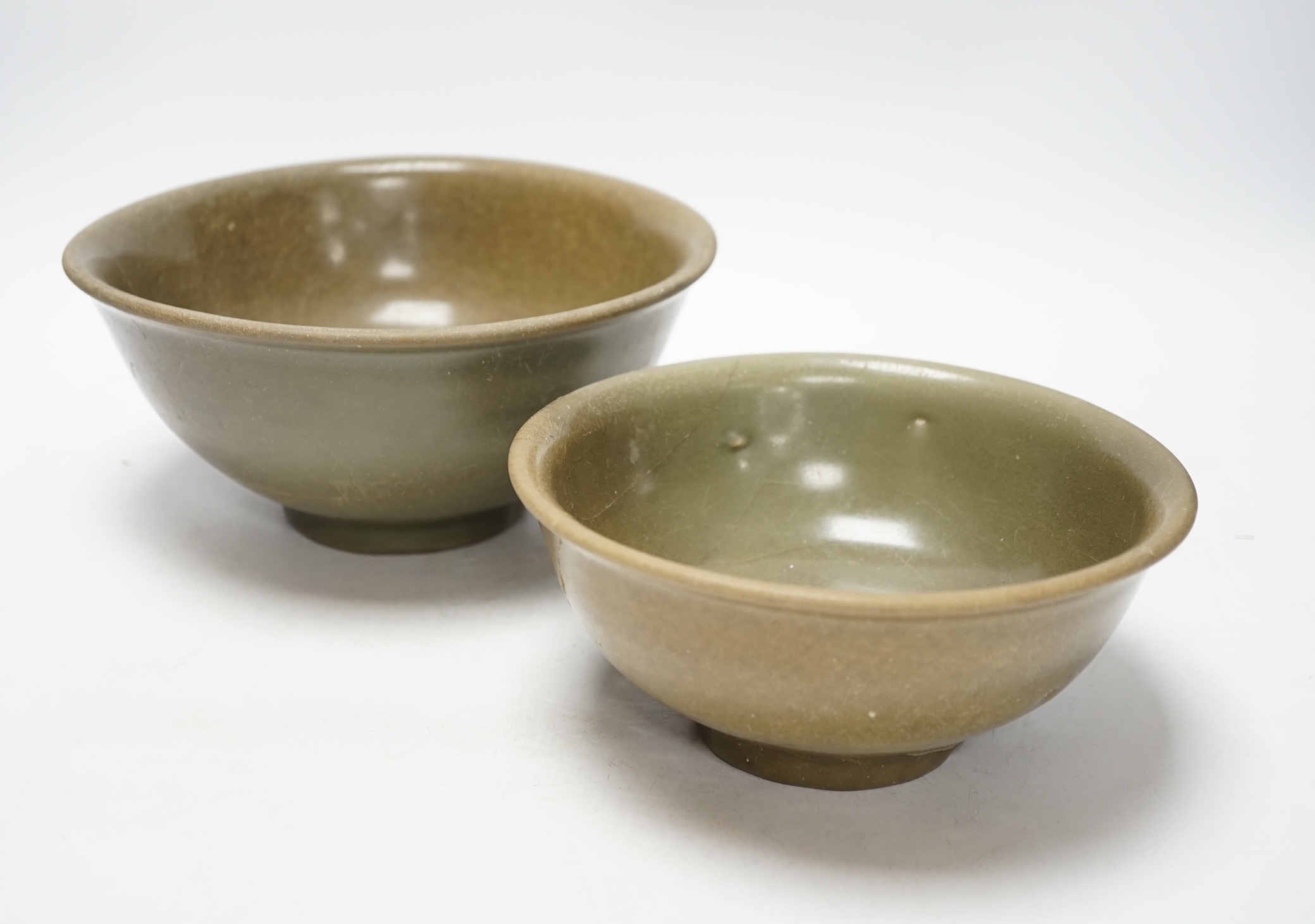 Two Chinese celadon bowls, Yuan-Ming dynasty, largest 22.5cm diameter